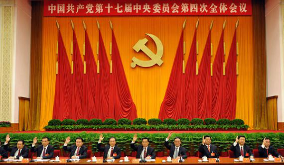 這是胡錦濤、吳邦國、溫家寶、賈慶林、李長春、習(xí)近平、李克強、賀國強、周永康在主席臺上。新華社記者黃敬文攝